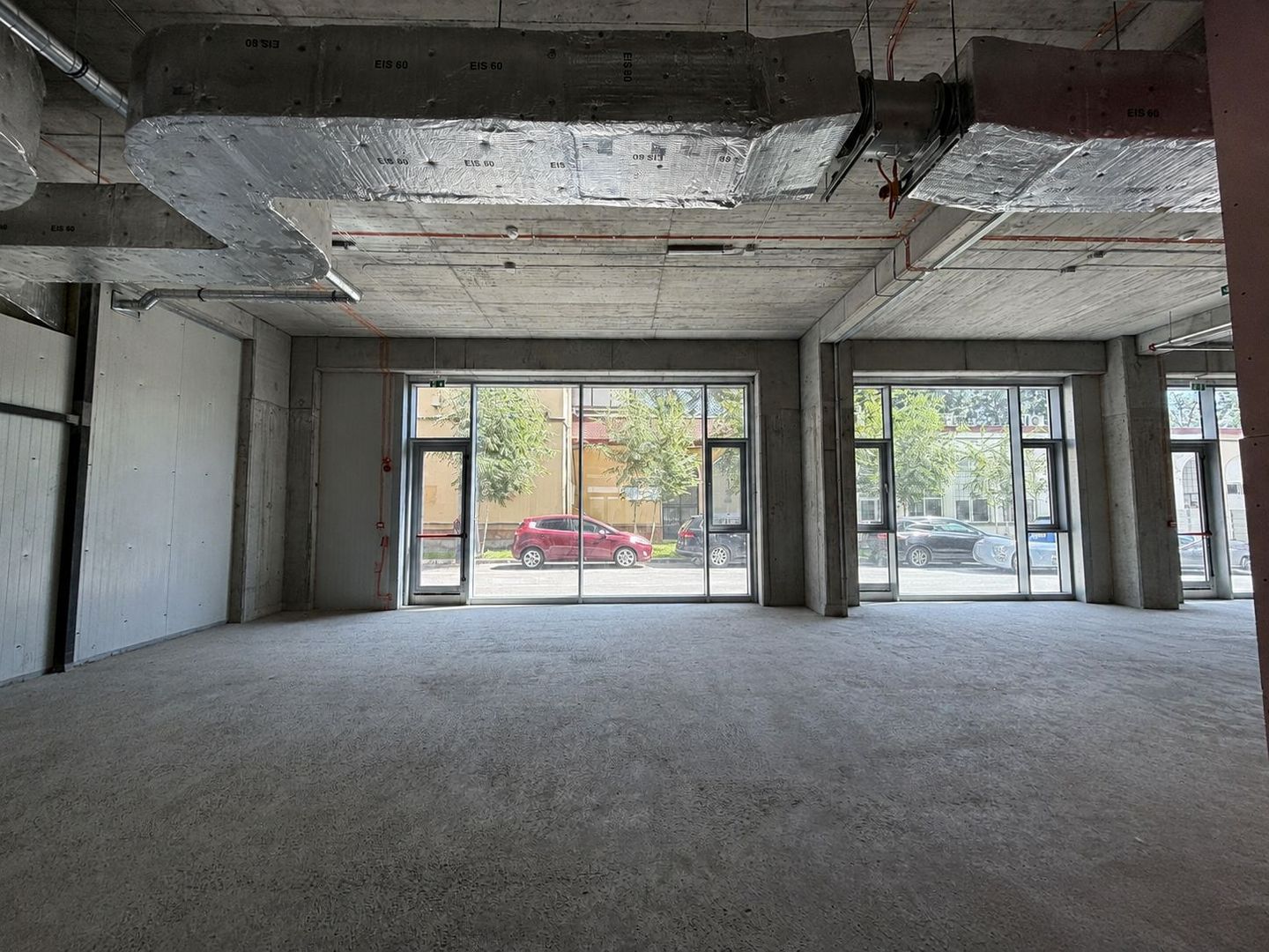Modern commercial space with high ceilings and multiple design possibilities